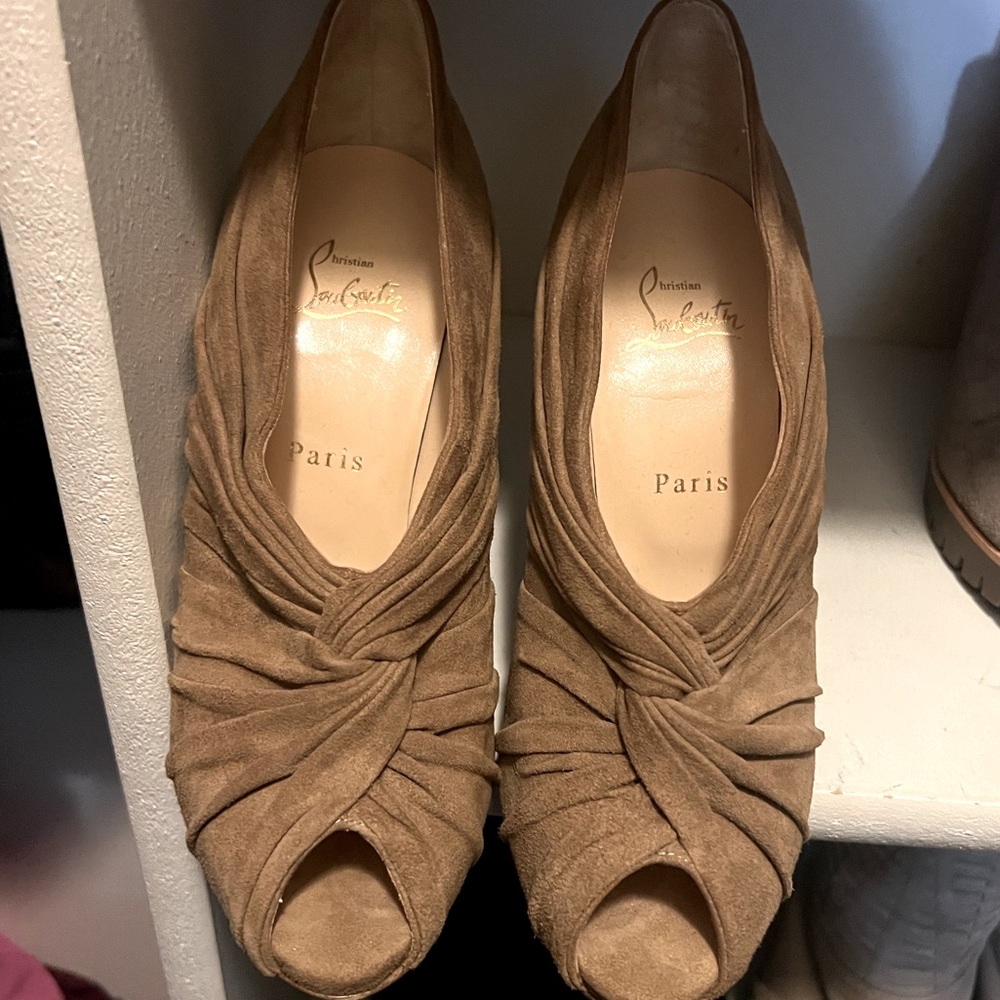 Christian Louboutin peep toe heel sandals. Size 39. They do run small.